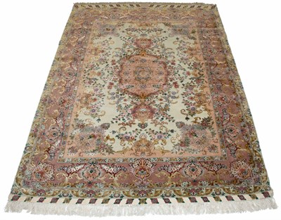 Lot 597 - Kurkwool and Silk Tabriz Rug Northwest Iran,...