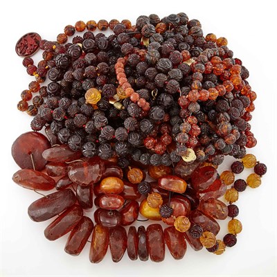 Lot 1818 - Group of Carved Amber and Rough Cut Amber Necklaces