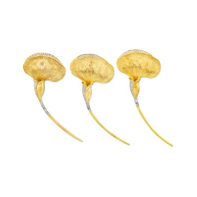 Lot 259 - Three Two-Color Gold and Diamond Ginko Leaf Clip-Brooches