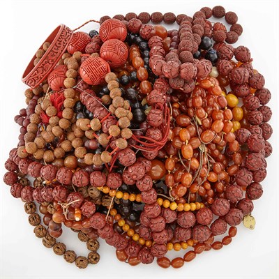 Lot 1848 - Group of Carved and Smooth Cinnabar, Amber and Wood Beads