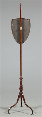 Lot 232 - Mahogany Pole Screen Shield shape on a tripod...
