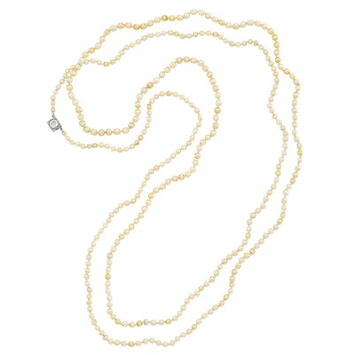Lot 101 - Long Natural Pearl Necklace with Platinum and Diamond Clasp