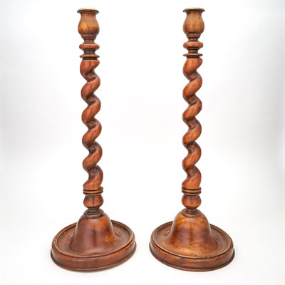 Lot 351 - Pair of Mahogany Barley-Twist Candlesticks...