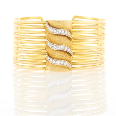 Lot 1034 - Gold and Diamond Cuff Bangle Bracelet