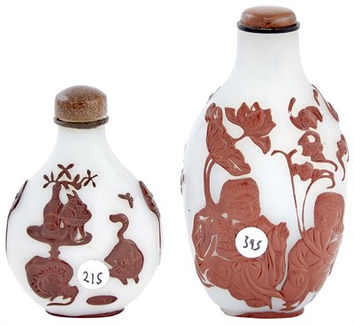 Lot 631 - Two Chinese Red-on-Milk Glass Snuff Bottles...