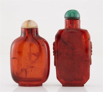 Lot 254 - Two Chinese Amber Snuff Bottles Qing Dynasty...