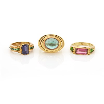 Lot 1940 - Gold, Iolite and Green Garnet Ring, Pink and Green Tourmaline Ring and Cabochon Tourmaline Ring