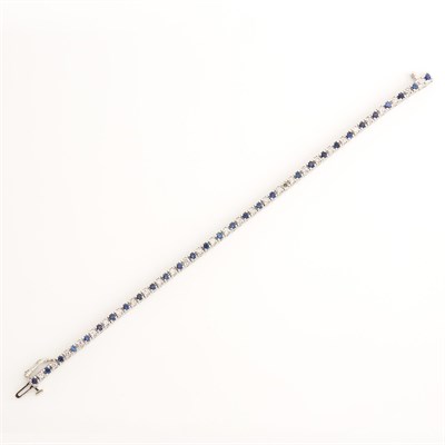 Lot 1429 - White Gold, Sapphire and Diamond Bracelet
