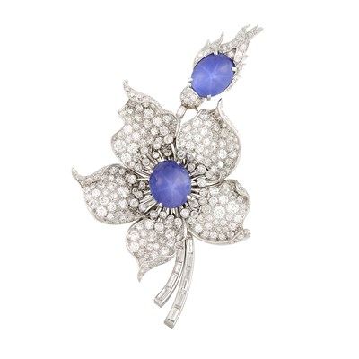 Lot 450 - Platinum, Star Sapphire and Diamond Flower Clip-Brooch