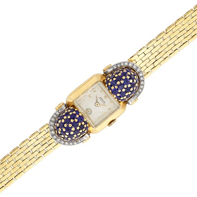 Lot 395 - Gold, Platinum, Sapphire and Diamond Bombé Wristwatch, Rolex