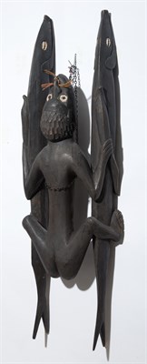 Lot 104 - African Carving of a Man with Fish Carved wood...
