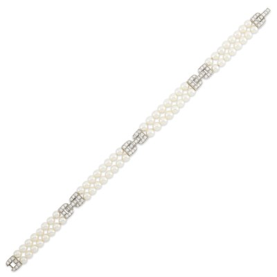 Lot 1223 - Double Strand Cultured Pearl, Platinum and Diamond Bracelet, Tiffany & Co.