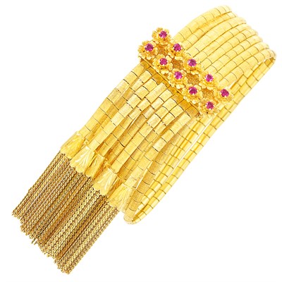 Lot 41 - Eight Strand Gold and Ruby Fringe Slide Bracelet