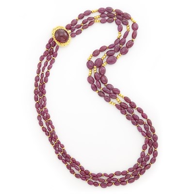 Lot 1555 - Triple Strand Ruby and Gold Bead Necklace with Gold and Cabochon Ruby Clasp