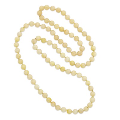 Lot 1938 - Long Yellow Jade Bead Necklace