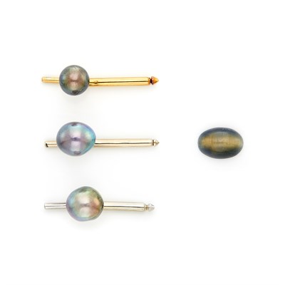 Lot 1723 - Three Yellow and White Gold and Baroque Gray Cultured Pearl Studs and Unmounted Cabochon Cat's Eye Chrysoberyl