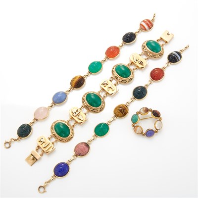 Lot 1325 - Three Gold, Gold-Filled and Hardstone Bracelets and Circle Brooch
