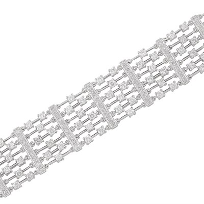 Lot 338 - Six Strand White Gold and Diamond Bracelet