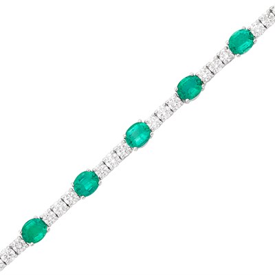 Lot 533 - White Gold, Diamond and Emerald Bracelet