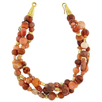 Lot 631 - Triple Strand Agate and Gold Bead Necklace, Elizabeth Gage