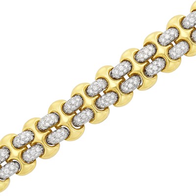 Lot 477 - Two-Color Gold and Diamond Bracelet