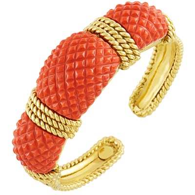 Lot 356 - Gold and Carved Coral Bangle Bracelet