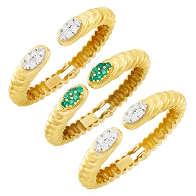 Lot 263 - Three Gold, Diamond and Emerald Bangle Bracelets