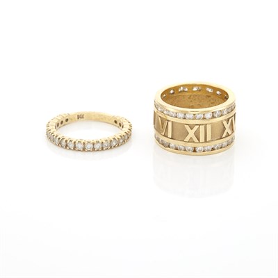 Lot 1238 - Gold and Simulated Diamond Roman Numeral Band Ring and Diamond Band Ring