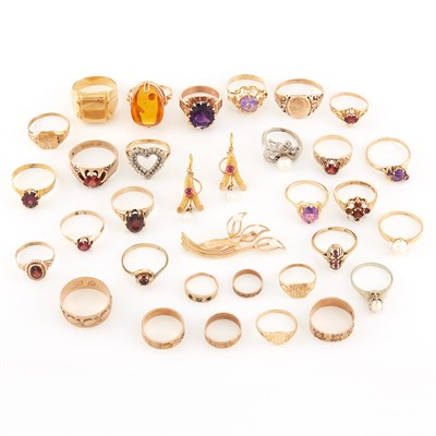 Lot 1777 - Group of Gold, Metal and Gem-Set Rings, Pin and Pair of Earrings