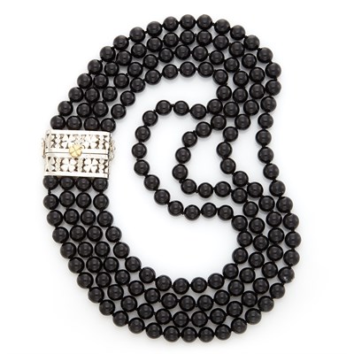 Lot 1682 - Four Strand Black Coral Bead Necklace with Silver and Gold Clasp