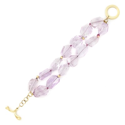 Lot 1542 - Double Strand Gold and Amethyst Bead Bracelet