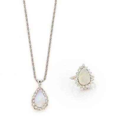 Lot 1239 - White Gold, Opal and Diamond Pendant with Chain Necklace and Ring