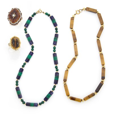 Lot 1738 - Two Gold-Filled, Tiger's Eye, Sodalite and Malachite Bead Necklaces, Carved Agate Ring and Gold and Tiger's Eye Ring