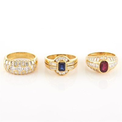 Lot 2045 - Three Gold, Diamond, Ruby and Sapphire Rings, Damiani