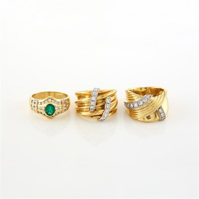 Lot 1733 - Three Two-Color Gold, Diamond and Emerald Rings, Damiani