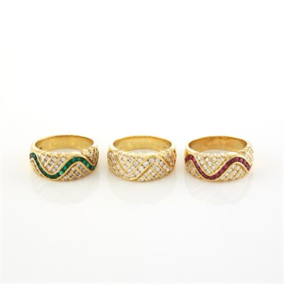 Lot 1539 - Three Gold, Diamond, Emerald and Ruby Rings, Damiani