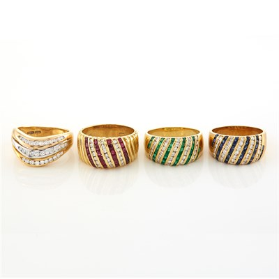 Lot 1742 - Four Gold, Diamond, Ruby, Emerald and Sapphire Rings, Damiani