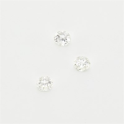 Lot 1676 - Three Unmounted Diamonds