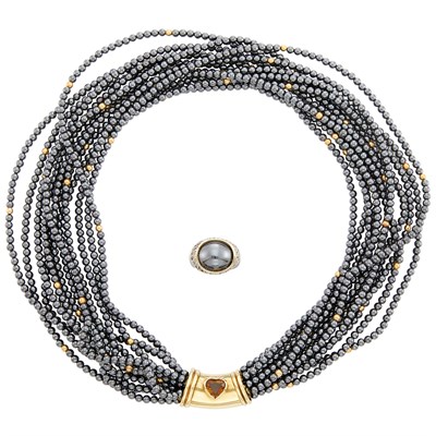 Lot 131 - Twelve Strand Hematite Bead, Gold and Citrine Torsade Necklace and Hematite, Gold and Diamond Ring