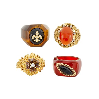 Lot 98 - Four Gold, Carnelian, Tiger's Eye, Black Onyx, Enamel and Diamond Rings