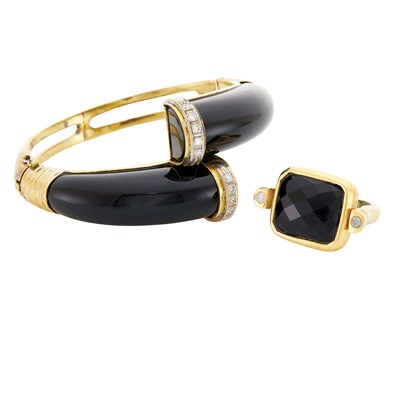 Lot 418 - Gold, Black Onyx and Diamond Crossover Bangle Bracelet and Ring