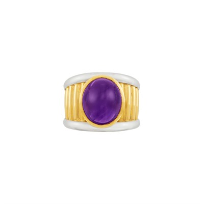 Lot 240 - Two-Color Gold and Cabochon Amethyst Ring