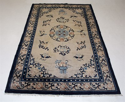 Lot 318 - Chinese Rug China, circa 1900 The buff field...