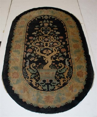 Lot 597 - Chinese Oval Carpet China, circa 1925 The...
