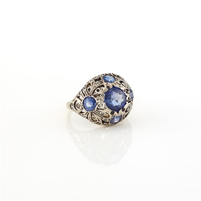 Lot 1245 - Silver, Gold and Synthetic Sapphire Ring