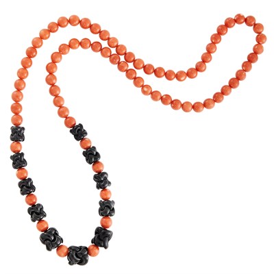 Lot 347 - Long Coral and Carved Onyx Bead Necklace