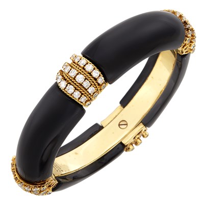 Lot 352 - Gold, Black Onyx and Diamond Bangle Bracelet, Van Cleef & Arpels