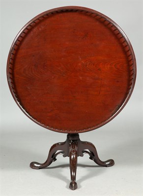 Lot 378 - George II Mahogany Tripod Table The galleried...