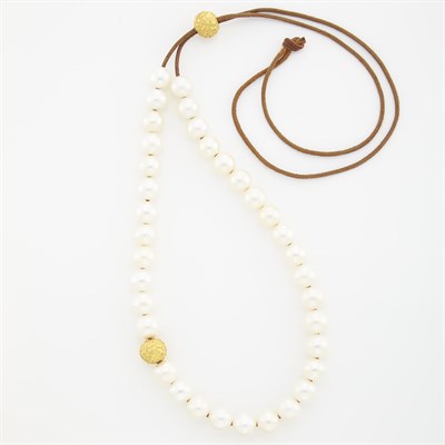 Lot 1007 - Freshwater Pearl and Gold Bead Necklace on Leather Cord, by Linda Lee Johnson
