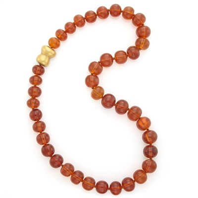 Lot 1036 - Amber Bead Necklace with Gold Clasp, Linda Lee Johnson